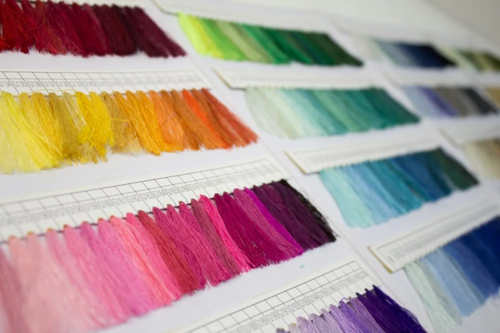 Illustration for The moment the fabric is unrolled, it's covered in creases. The dyehouse calls it 'normal,' while the garment factory rejects it as scrap—so who actually foots the bill?