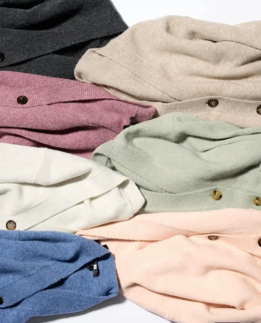Soft knitted button-front cardigans in charcoal, oatmeal, pink, sage, ivory, blue and peach